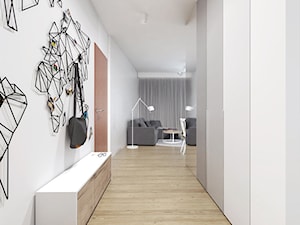Projekt 5 - Duży z wieszakiem biały hol / przedpokój, styl minimalistyczny - zdjęcie od PASS Architekci