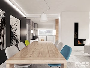 Projekt 6 - Duża biała czarna jadalnia w salonie, styl skandynawski - zdjęcie od PASS Architekci