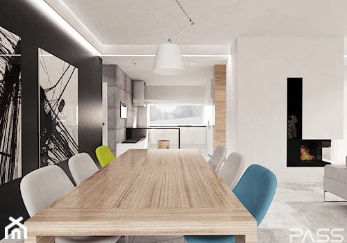 Projekt 6 - Duża biała czarna jadalnia w salonie, styl skandynawski - zdjęcie od PASS Architekci