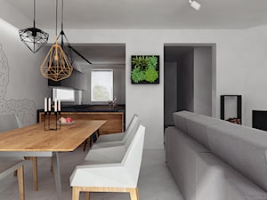 Duża szara jadalnia w salonie, styl minimalistyczny - zdjęcie od PASS Architekci