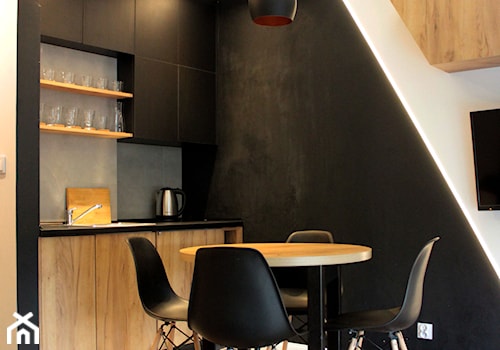Aneks kuchenny z jadalnią z apartamencie butikowym - zdjęcie od NOVI projektowanie