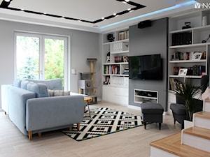 Dom jednorodzinny - Mały biały szary salon, styl skandynawski - zdjęcie od NOVI projektowanie