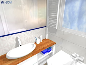 Łazienka z niebieskim sufitem - zdjęcie od NOVI projektowanie