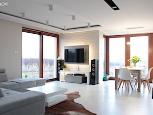 Salon z białą cegłą - zdjęcie od NOVI projektowanie