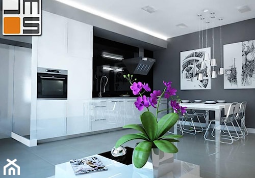 Pomysł na czarno - biały aneks kuchenny połączony z jadalnią i salonem - zdjęcie od jms STUDIO s.c.
