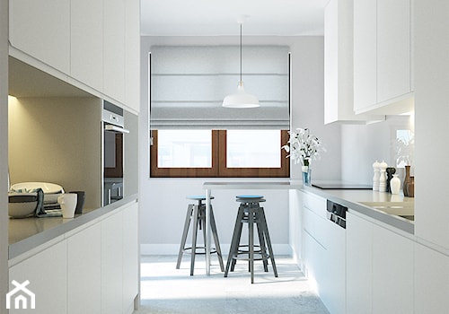 Duża otwarta biała z zabudowaną lodówką kuchnia w kształcie litery u - zdjęcie od Optim Group Architecture & Design