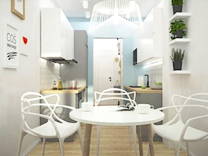 Remont mieszkania pod inwestycję - Mała biała niebieska jadalnia w kuchni, styl skandynawski - zdjęcie od Wnętrza od NOWA
