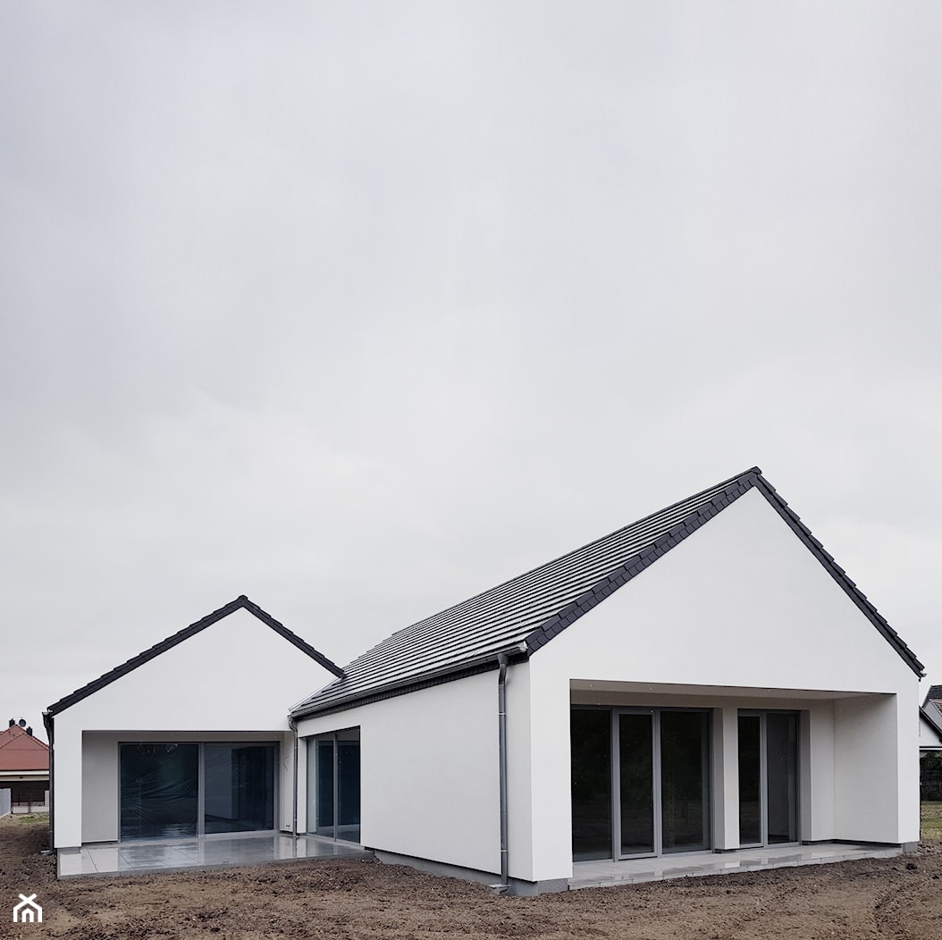 Dom z Tarasami - dach skośny - zdjęcie od PAG - Pracownia Architektury Głowacki - Homebook