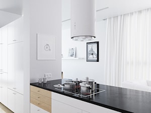 Biały okap wyspowy Cylindro w nowoczesnej kuchni - zdjęcie od GLOBALO.PL - Ciche i wydajne okapy kuchenne