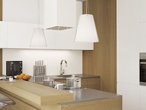 Biały okap Toredo w minimalistycznej kuchni - zdjęcie od GLOBALO.PL - Ciche i wydajne okapy kuchenne