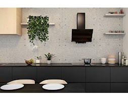 Szklany okap Divergo Black w nowoczesnej minimalistycznej kuchni z betonem architektonicznym