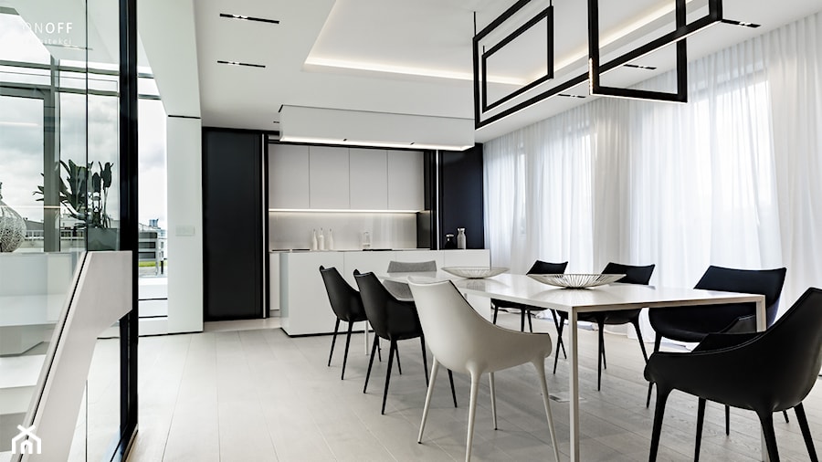 Minimalistyczny apartament Mokotów - Duża otwarta biała czarna z zabudowaną lodówką kuchnia dwurzędowa z oknem, styl minimalistyczny - zdjęcie od ON/OFF Architekci