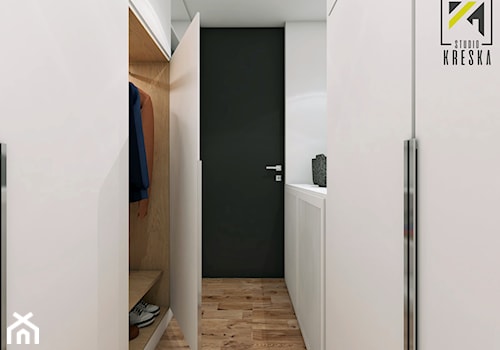 Nowoczesny dwupoziomowe mieszkanie w Głogowie - Mała otwarta garderoba, styl minimalistyczny - zdjęcie od kreska.studio