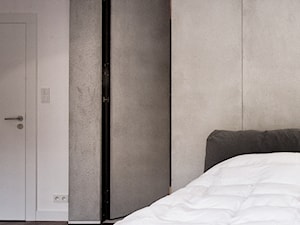 Apartament w Gdyni projekt: Andrzej Niegrzybowski - Sypialnia, styl minimalistyczny - zdjęcie od B-loft beton dekoracyjny