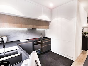 Projekt mieszkania 70m2- Wawa 2017 - Mała otwarta biała szara z zabudowaną lodówką z podblatowym zle ... - zdjęcie od BIBI