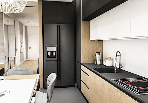 Projekt Mieszkania W-wa 2019 - Średnia otwarta z kamiennym blatem biała czarna z zabudowaną lodówką z podblatowym zlewozmywakiem kuchnia w kształcie litery l - zdjęcie od BIBI Designe