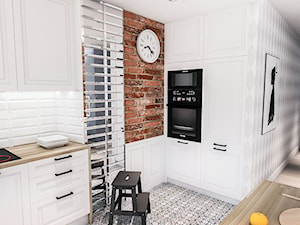 Projekt kuchni i salonu w Łodzi 35 m2 - Średnia otwarta biała z zabudowaną lodówką kuchnia w kształc ... - zdjęcie od BIBI