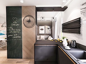 Projekt mieszkania 70m2- Wawa 2017 - Średnia z salonem biała czarna z zabudowaną lodówką z podblatow ... - zdjęcie od BIBI