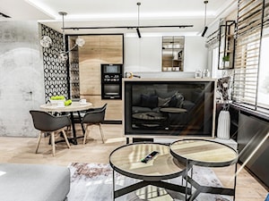 Projekt mieszkania - Gdańsk 2019 r. - Średni biały czarny salon z kuchnią z jadalnią, styl nowoczesny - zdjęcie od BIBI Designe