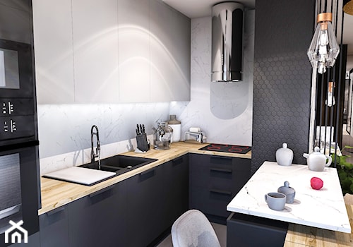 PROJEKT MIESZKANIA - ŁÓDZ 2018 - Mała otwarta czarna szara z zabudowaną lodówką z nablatowym zlewozmywakiem kuchnia w kształcie litery u z marmurem nad blatem kuchennym - zdjęcie od BIBI Designe