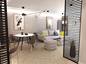 Projekt mieszkania W Warszawie, 58 m2 - Średni szary salon z jadalnią - zdjęcie od BIBI