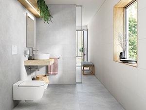 Jasna łazienka z płytkami imitującymi beton i umywalką nablatową - zdjęcie od Roca