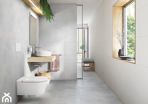 Jasna łazienka z płytkami imitującymi beton i umywalką nablatową - zdjęcie od Roca