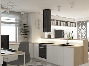 Projekt przytulnego mieszkania - Średnia otwarta z salonem biała z zabudowaną lodówką z nablatowym zlewozmywakiem kuchnia w kształcie litery u z oknem, styl nowoczesny - zdjęcie od Stojak Studio