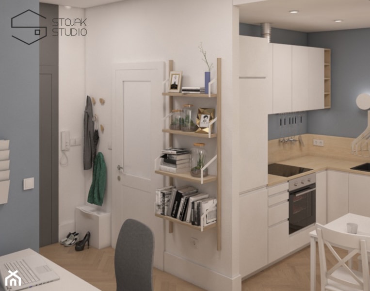Niewielkie mieszkania na wynajem - Średni z wieszakiem biały hol / przedpokój, styl skandynawski - zdjęcie od Stojak Studio