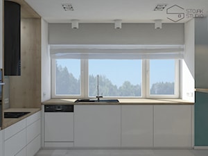 Dom nad Bzurą - Średnia otwarta biała z zabudowaną lodówką z nablatowym zlewozmywakiem kuchnia w kształcie litery l z oknem, styl nowoczesny - zdjęcie od Stojak Studio