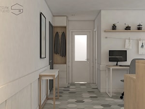Projekt przytulnego mieszkania - Średni z wieszakiem biały hol / przedpokój, styl nowoczesny - zdjęcie od Stojak Studio