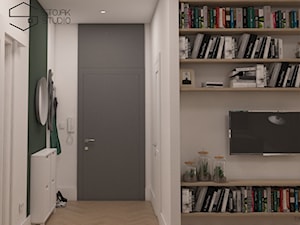 Niewielkie mieszkania na wynajem - Średni z wieszakiem czarny szary hol / przedpokój, styl skandynawski - zdjęcie od Stojak Studio