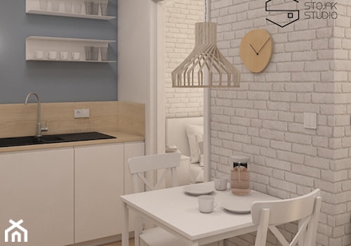 Niewielkie mieszkania na wynajem - Mała otwarta biała szara z nablatowym zlewozmywakiem kuchnia jednorzędowa, styl skandynawski - zdjęcie od Stojak Studio