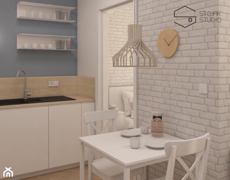 Niewielkie mieszkania na wynajem - Mała otwarta biała szara z nablatowym zlewozmywakiem kuchnia jednorzędowa, styl skandynawski - zdjęcie od Stojak Studio