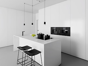 APARTAMENT W ŁODZI - Średnia otwarta biała z zabudowaną lodówką z podblatowym zlewozmywakiem kuchnia jednorzędowa z wyspą lub półwyspem, styl minimalistyczny - zdjęcie od INUTI