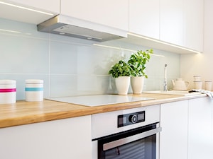 Apartament 60-metrowy w Kielcach - całość - Z zabudowaną lodówką kuchnia jednorzędowa, styl nowoczesny - zdjęcie od Paweł Liszewski