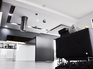 Salon z widokiem na kuchnię - zdjęcie od Am Design Studio projektowania wnętrz