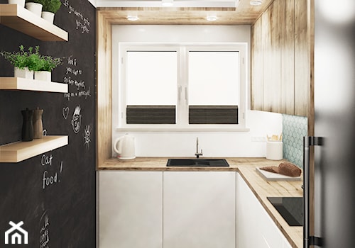 dom #1, Gdańsk - Mała zamknięta biała z zabudowaną lodówką z nablatowym zlewozmywakiem kuchnia w kształcie litery l z oknem, styl nowoczesny - zdjęcie od JUST studio projektowe