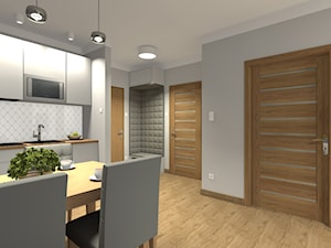 Apartament w Zakopanem ul. Piłsudskiego - Mała otwarta z salonem biała szara z zabudowaną lodówką z nablatowym zlewozmywakiem kuchnia jednorzędowa, styl nowoczesny - zdjęcie od Medyńscy Projektowanie