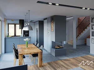 Projekt re-aranżacji wnętrz domu jednorodzinnego w Michałowicach - Duża szara jadalnia w kuchni, styl nowoczesny - zdjęcie od mleczko architektura