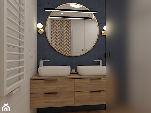 Praktyczna łazienka  z wanną i prysznicem w jasnych barwach z akcentami