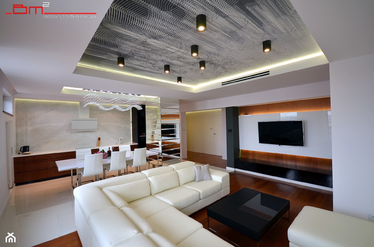 apartament 140m2 - Duży biały salon z kuchnią z jadalnią, styl minimalistyczny - zdjęcie od bm2 brzostek maciej - Homebook
