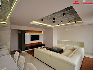 apartament 140m2 - Duży biały salon z kuchnią z jadalnią, styl minimalistyczny - zdjęcie od bm2 brzostek maciej