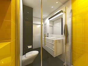 mała łazienka z żółtym brodzikiem
