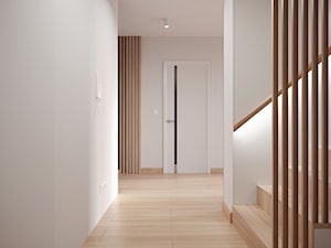 Jasny hol z drewnianymi schodami - zdjęcie od OHHOME - projekty, remonty, meble