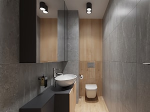 Wąska łazienka z grafitowymi płytkami - zdjęcie od OHHOME - projekty, remonty, meble