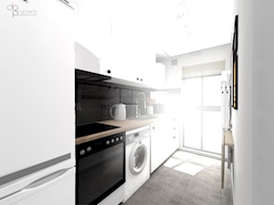 czarno- biała kuchnia - zdjęcie od dopracownia architektoniczna