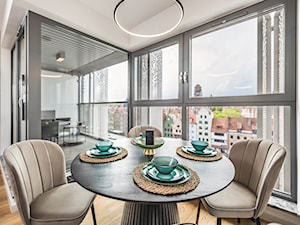 Apartament Wyspa Spichrzów - Mała biała jadalnia w salonie w kuchni, styl nowoczesny - zdjęcie od Pracownia Projektowa Decoretti - Agata Jachimowicz