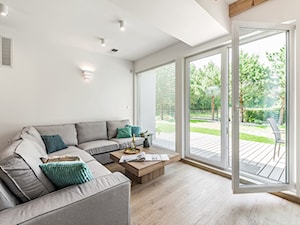 Domy w Jantarze - Średni biały salon, styl skandynawski - zdjęcie od Pracownia Projektowa Decoretti - Agata Jachimowicz