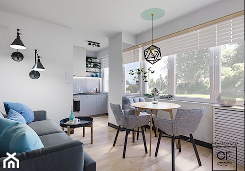 Małe mieszkanie z nutą ekstrawagancji - Mały biały salon z kuchnią z jadalnią, styl nowoczesny - zdjęcie od O.Fiedorowicz